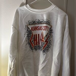 XL white Kansas City Chiefs sweatshirt 
Bottom is cut